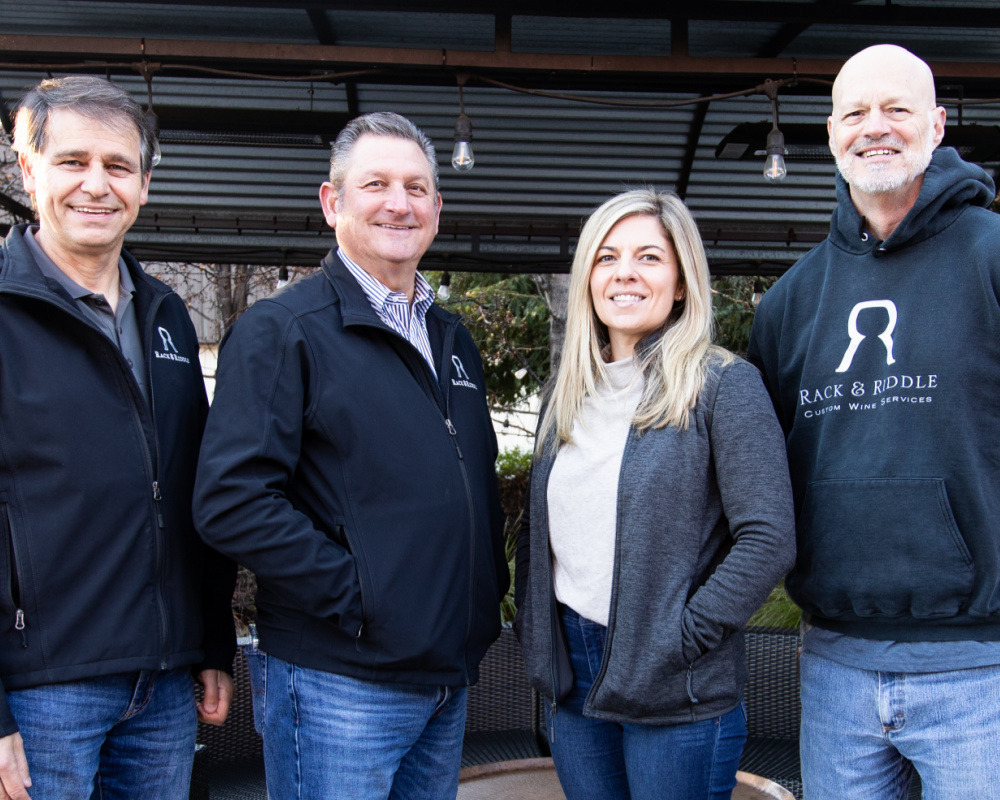 Four Rack and Riddle team members at the Rack and Riddle facility<br />
